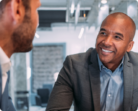 Two black men talking